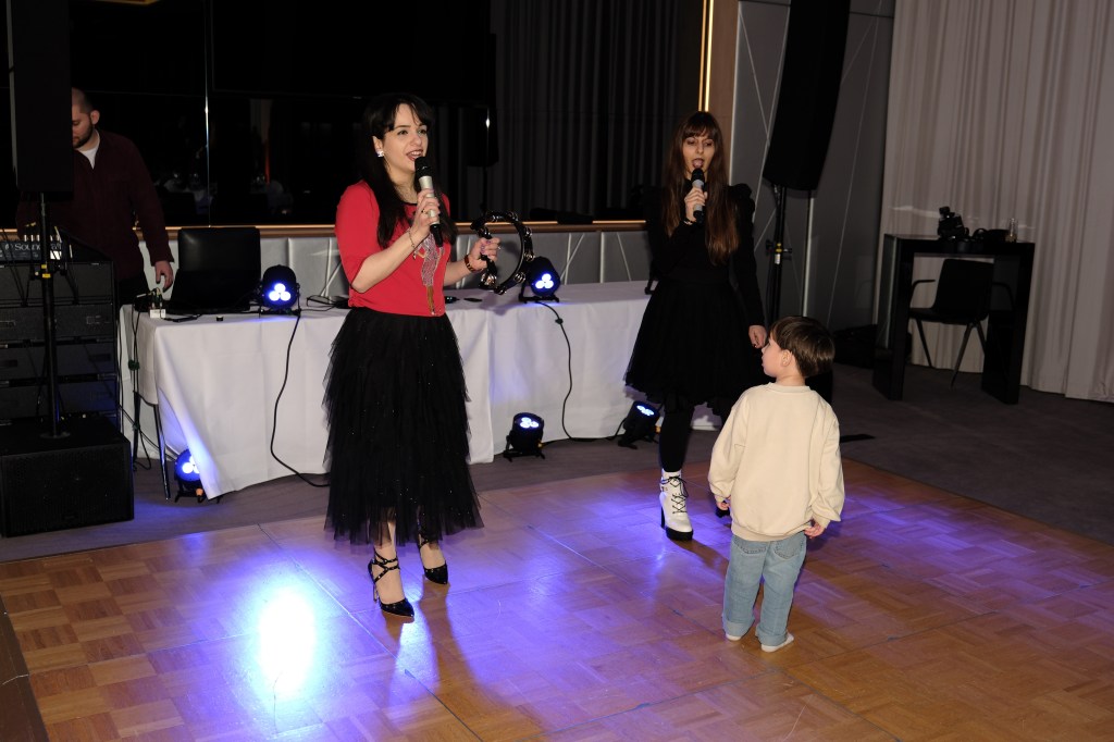 Singing "Incredible" by Vanilla Ninja in a duet.